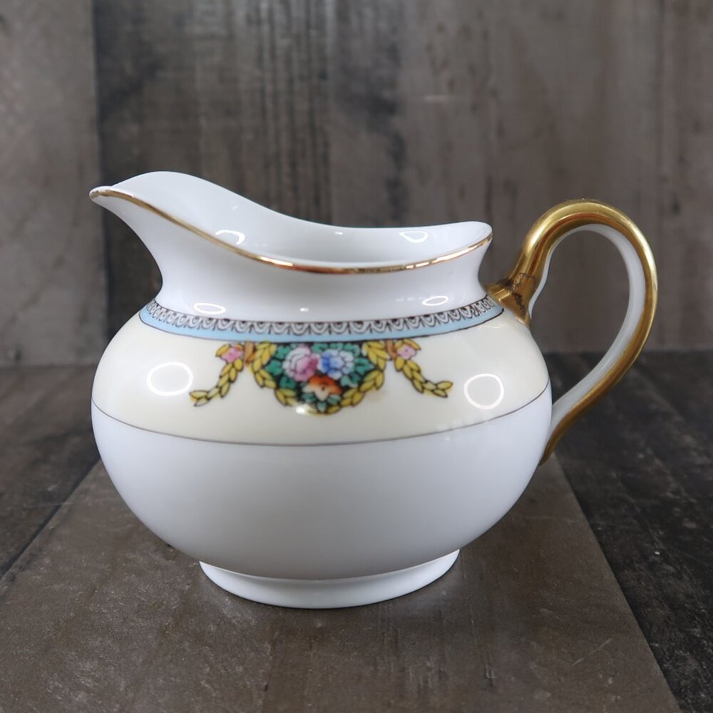 Meito China Vintage Porcelain Creamer Pitcher Gilded Handle Floral Wreath Blue